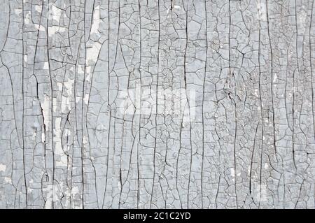 old wooden surface with cracked paint. Background Stock Photo