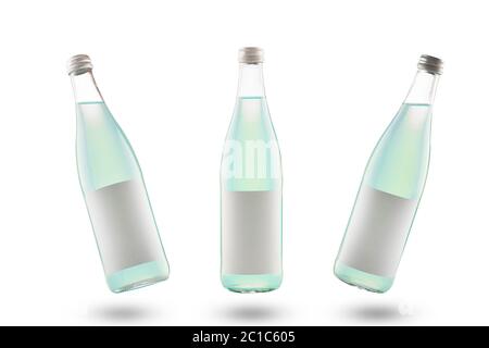 three clear glass bottles with light green guava or lime juice lemonade juice or alcoholic cocktail with a clean empty yoke. isolate on a white backgr Stock Photo