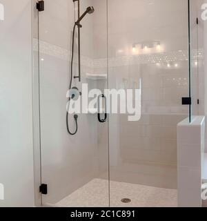 https://l450v.alamy.com/450v/2c1c891/square-bathroom-shower-stall-with-half-glass-enclosure-adjacent-to-built-in-bathtub-2c1c891.jpg