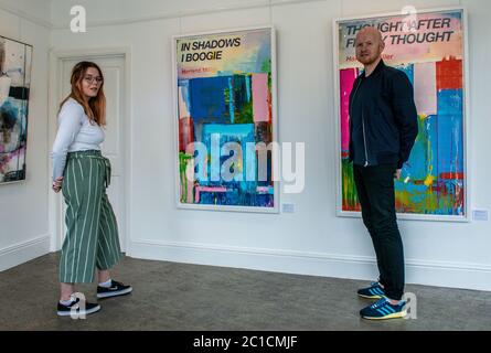 Harrogate, 15th June 2020. Richard McTague, owner of independent art gallery RedHouse Originals and assistant gallery manager Emily Merriott put the final touches ahead of today's reopening for the first time since lockdown. Credit: ernesto rogata/Alamy Live News Stock Photo