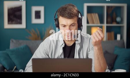 Man talking through internet Stock Photo