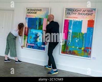 Harrogate, 15th June 2020. Richard McTague, owner of independent art gallery RedHouse Originals and assistant gallery manager Emily Merriott put the final touches ahead of today's reopening for the first time since lockdown. Credit: ernesto rogata/Alamy Live News Stock Photo