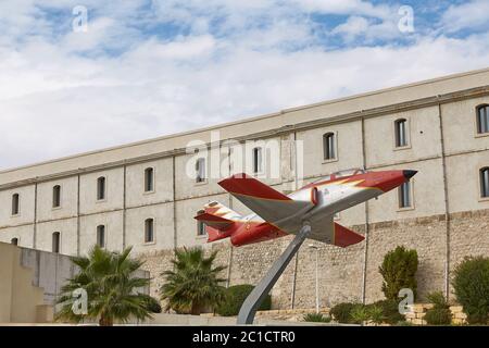 Model of a plane in front of technical university in Cartagena, area of Murcia in Spain Stock Photo