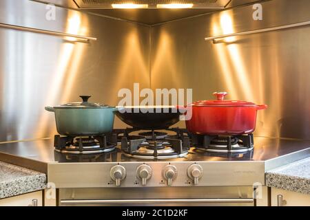 https://l450v.alamy.com/450v/2c1d2kf/elegant-kitchen-for-workshop-cooking-in-hotel-have-a-equipment-luxury-and-closeup-pot-on-the-gas-stove-which-has-fire-2c1d2kf.jpg