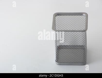 Empty holder cup for pens on white background Stock Photo