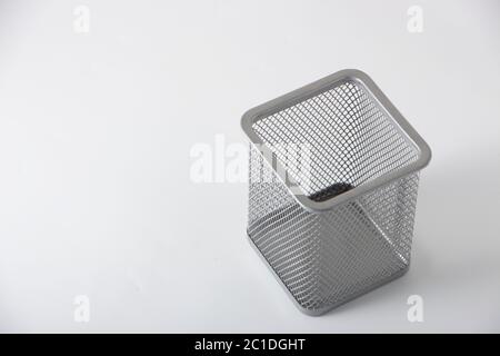 Empty holder cup for pens on white background Stock Photo