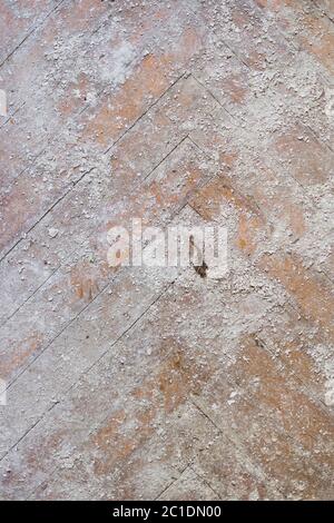 A close-up of an old faded parquet covered with dust and dirt. Result of repair. Cleaning and cleaning required Stock Photo