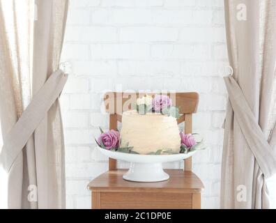 Wedding cake on cake stand Stock Photo