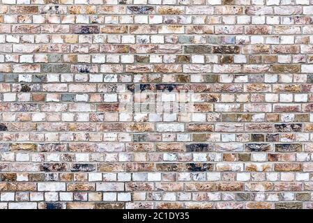Background from a historic old stone wall Stock Photo