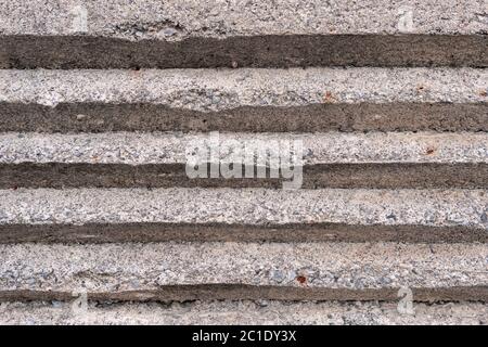 Old concrete embossed wall with bumps. Gray abstract background Stock Photo
