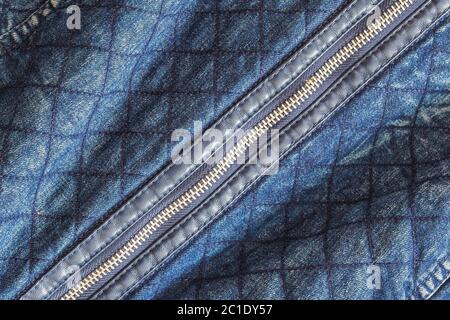 clothes, wear and fashion concept - close up of denim item or jeans zipper Stock Photo