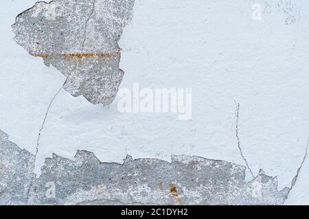 Concrete wall with cracked gray stucco. Abstract gray background Stock Photo