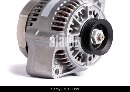New car power generator, isolated on white background. Details of the engine of the car. Stock Photo