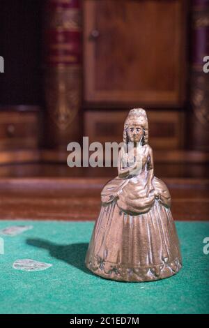 Studio photo of retro bronze woman figurine of the 18th style dress. Western Europe. 19th century Stock Photo