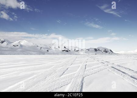 empty brick ground with sonw mountain as background Stock Photo