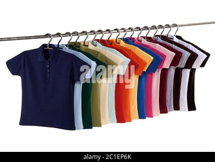 polo shirts on hanging rail isolated on white Stock Photo