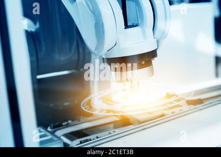 industrial machine and factory robot arm,Smart factory industry 4.0 concept. Stock Photo