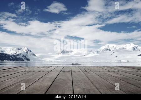 empty brick ground with sonw mountain as background Stock Photo