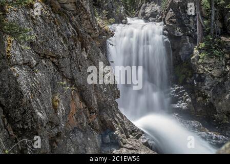 Brown's Creek Waterfall Long Exposure with Blurred Water Motion and Water Cascading on Rocks in Colorado Stock Photo