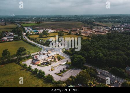 An Aerial View of a typical British pub on a cloudy summer day Stock Photo