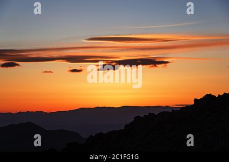 golden sunset from a desert mountain ridge Stock Photo