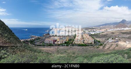 Tenerife, Canary Islands - Panorama of Los Cristianos with the arriving ferry from La Gomera Stock Photo