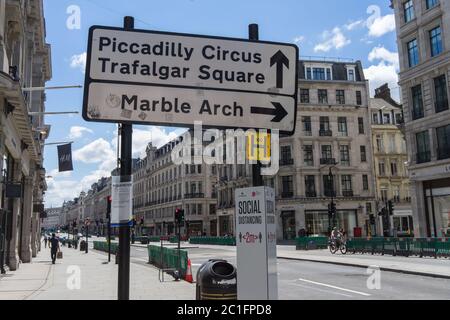 Road sign down Regent Street showing the way to Piccadilly Circus, Trafalgar Square and Marble Arch. London Stock Photo
