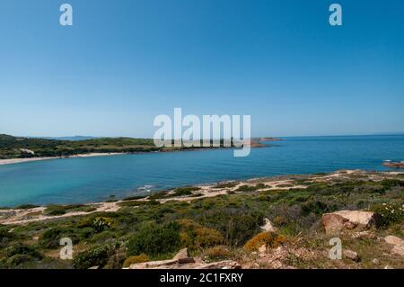 Rock pink granitic formation at Costa Paradiso beach in Sardinia Italy with turquoise blue sea Stock Photo