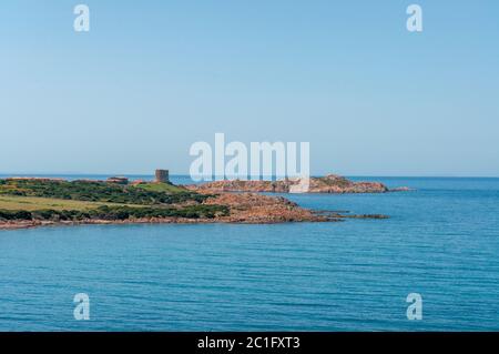 Rock pink granitic formation at Costa Paradiso beach in Sardinia Italy with turquoise blue sea Stock Photo