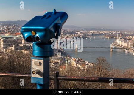 Coin operated public binoculars at Budapest. Blue telescope on observation deck Stock Photo