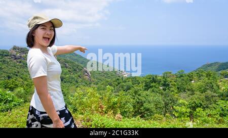 Women tourist on viewpoint at Koh Tao Stock Photo