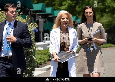 Washington, DC, USA. 15th June, 2020. Senior Counselor Kellyanne Conway, center, departs a television interview outside the White House in Washington, DC, U.S., on Monday, June 15, 2020. Credit: Stefani Reynolds/CNP | usage worldwide Credit: dpa/Alamy Live News Stock Photo