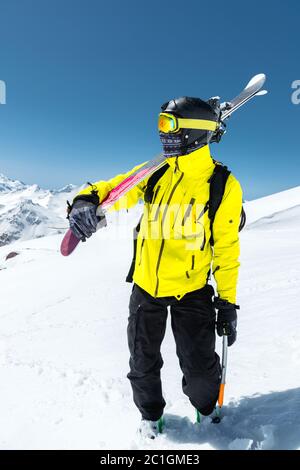 Download Portrait Of Skier In Protective Mask With Yellow Skis On Background Of Snowy Mountains And Forest Sunlight Stock Photo Alamy PSD Mockup Templates