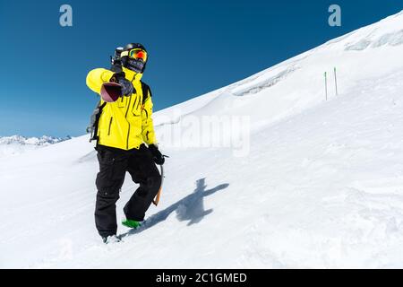 Download Portrait Of Skier In Protective Mask With Yellow Skis On Background Of Snowy Mountains And Forest Sunlight Stock Photo Alamy PSD Mockup Templates