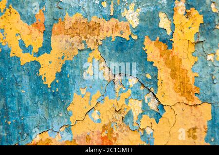Old painted wall - Blue and yellow texture Stock Photo