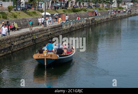 Empty tour boat at Otaru Canal, Hokkaido, Japan Stock Photo