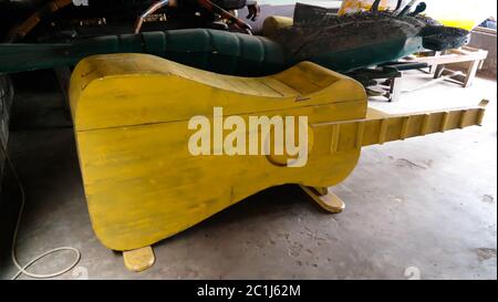 Funny traditional coffin in the shape of profession, guitar, guitarist, musician, musical instrument,,Accra in Ghana Stock Photo