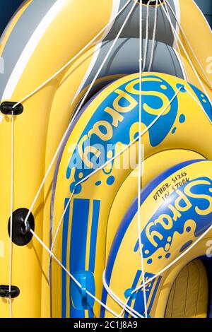 Weymouth Beach - Inflatable rubber dinghies and boats for sale at a beach goods kiosk. Weymouth, Dorset, England, UK. Stock Photo