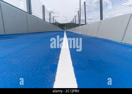 Tarrytown, NY - June 15, 2020: View of Mario Cuomo Bridge for pedestrian and bike riders path painted in blue in Tarrytown Stock Photo
