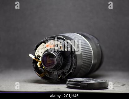 part of camera lens isolated on black background broken Stock Photo