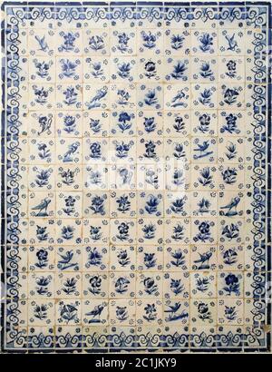 Portugal Typical old Portuguese "azulejos" - blue and white ceramic tiles depicting medieval depictions of birds and flowers. Stock Photo