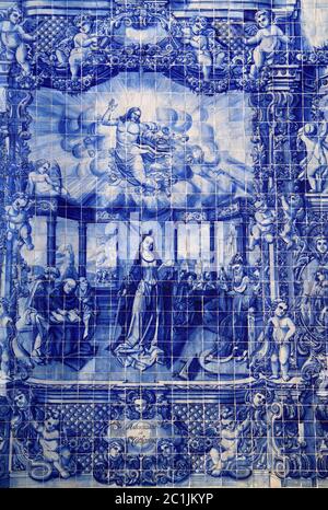 Portugal, Porto, Important historical blue and white ceramic 'Azulejo' tiles depicting Saint Catherine speaking to elders. Stock Photo