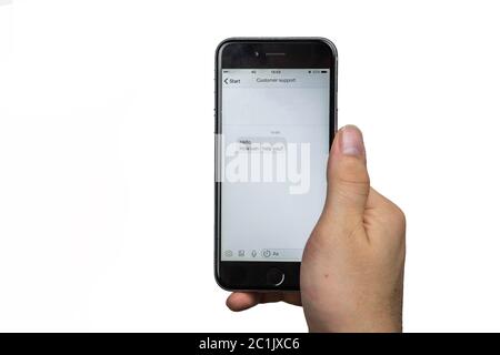 Customer Support Assistance Help Advice Client Concept, Asking a question online on a mobile phone Stock Photo