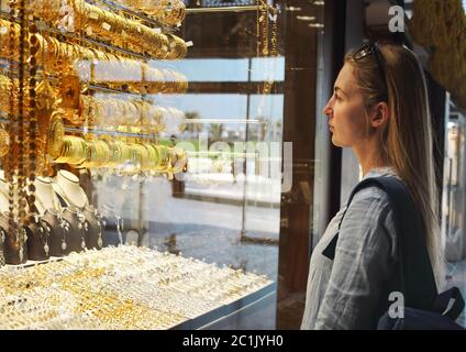 Woman on gold market in Sharjah City Stock Photo