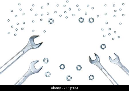 Spanners and screw nuts isolated on white background with copy space in center Stock Photo