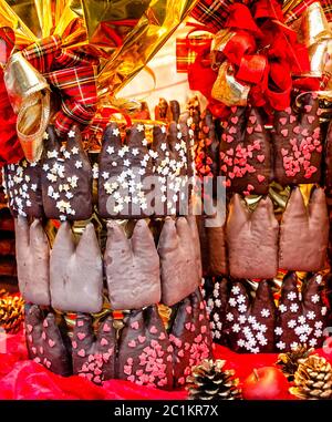 Cologne Cathedral shaped Gingerbread called tiny Dom (german â€œKoelner Doemchenâ€) with chocolate icing on the Christmas market in Cologne, Germany Stock Photo