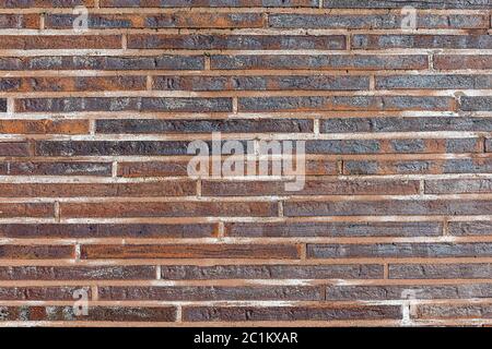 Background from small red clinker bricks Stock Photo