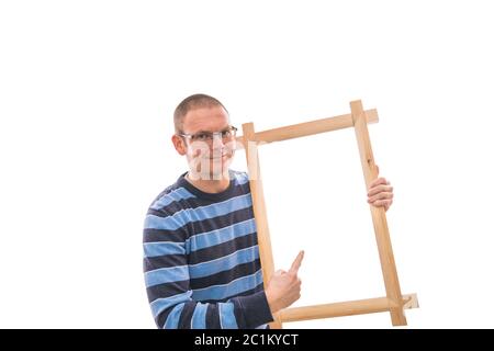 Man holds frame Stock Photo
