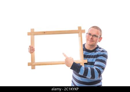 Man holds frame Stock Photo