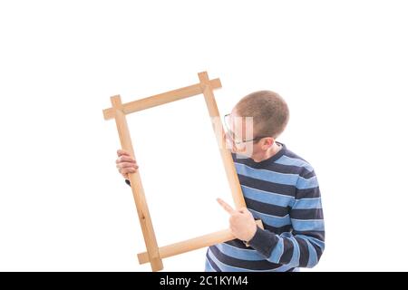 Man holds frame Stock Photo